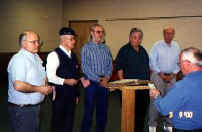 Initiation of new SUV Dennison Camp #1 members held at Veteran's Memorial in March 2000.